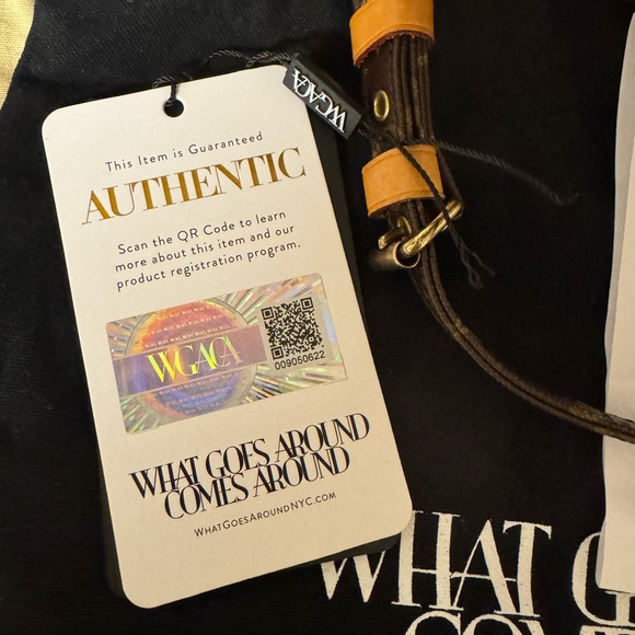 Louis Vuitton Brown Backpack with Iconic Monogram and Gold Hardware - Picture 5 of 8